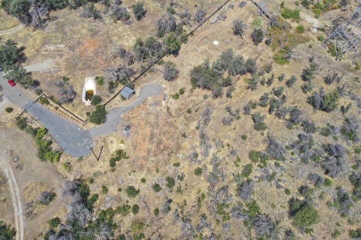 16266 Gold Pan Way Redding, CA 96001 - Photo 5 of 9 a view of a yard with green space