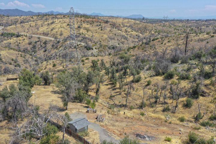 16266 Gold Pan Way Redding, CA 96001 - Photo 7 of 9 an aerial view of a house with a mountain