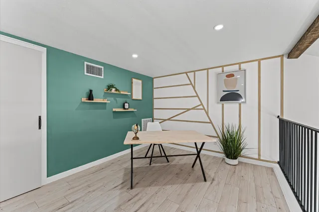 a view of entryway with wooden floor