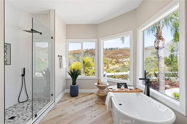 a view of a swimming pool with a lounge chairs
