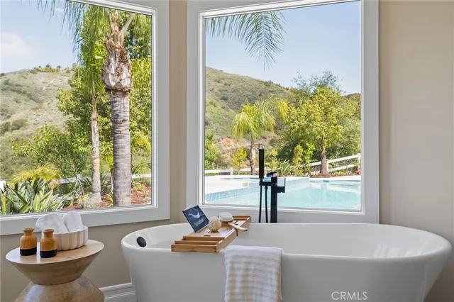 a view of a swimming pool with a yard