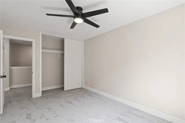 an aerial view of a house with yard swimming pool and outdoor seating