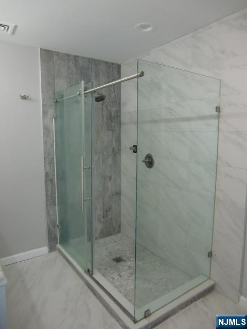 291 Liberty Road Englewood, NJ 07631 - Photo 26 of 49 a bathroom with a shower
