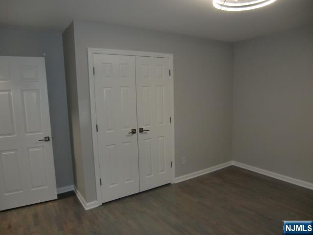 291 Liberty Road Englewood, NJ 07631 - Photo 28 of 49 an empty room with a hallway