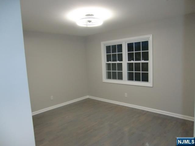 291 Liberty Road Englewood, NJ 07631 - Photo 29 of 49 an empty room with a window