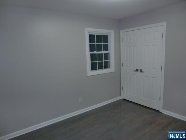 291 Liberty Road Englewood, NJ 07631 - Photo 32 of 49 an empty room with windows