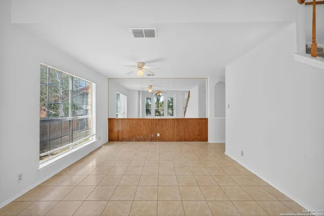 a view of room with window and hardwood floor