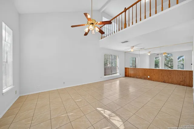 a view of an entryway and livingroom