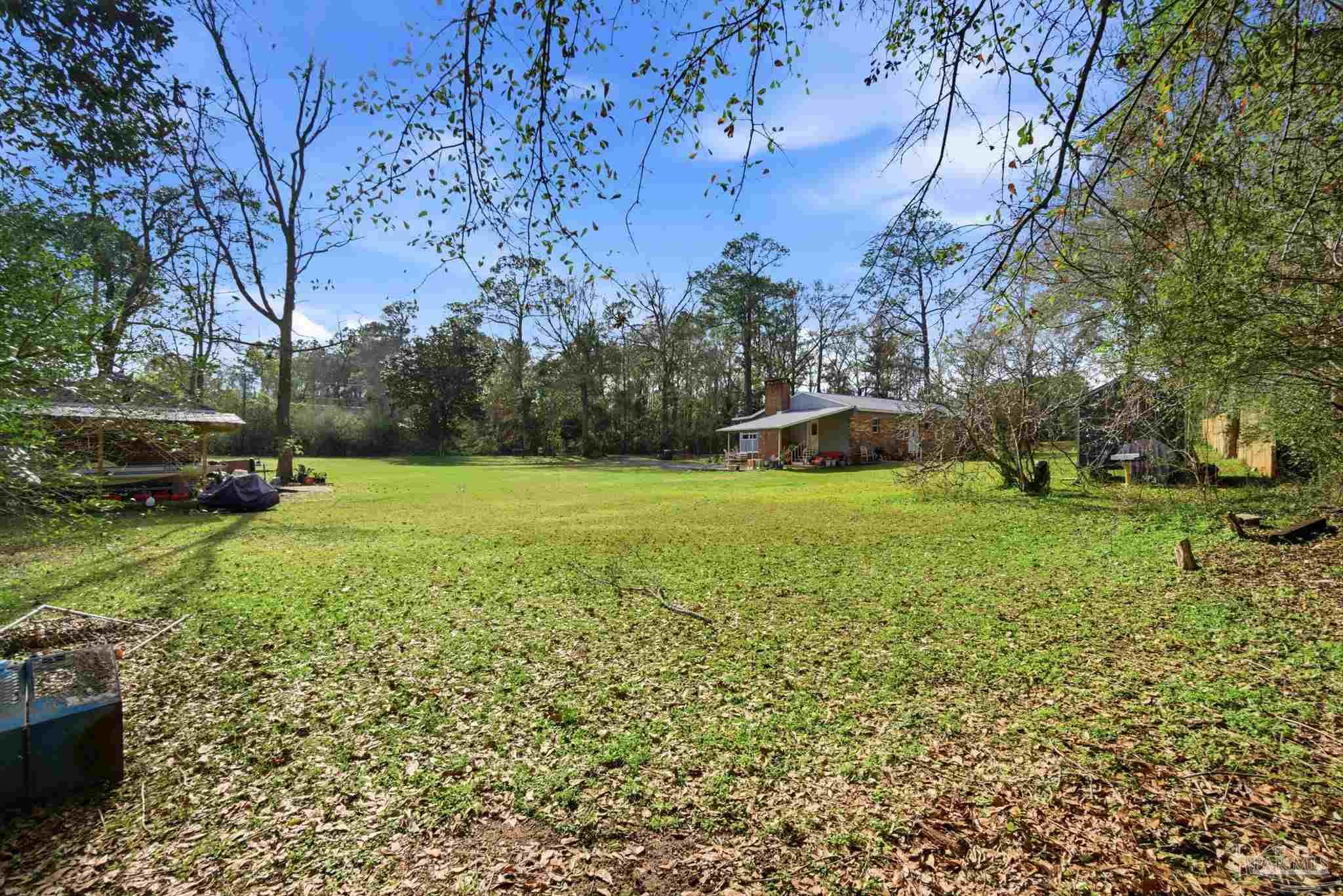 148 San Carlos Road Cantonment, FL 32533 - Photo 34 of 38 a view of a field with of trees