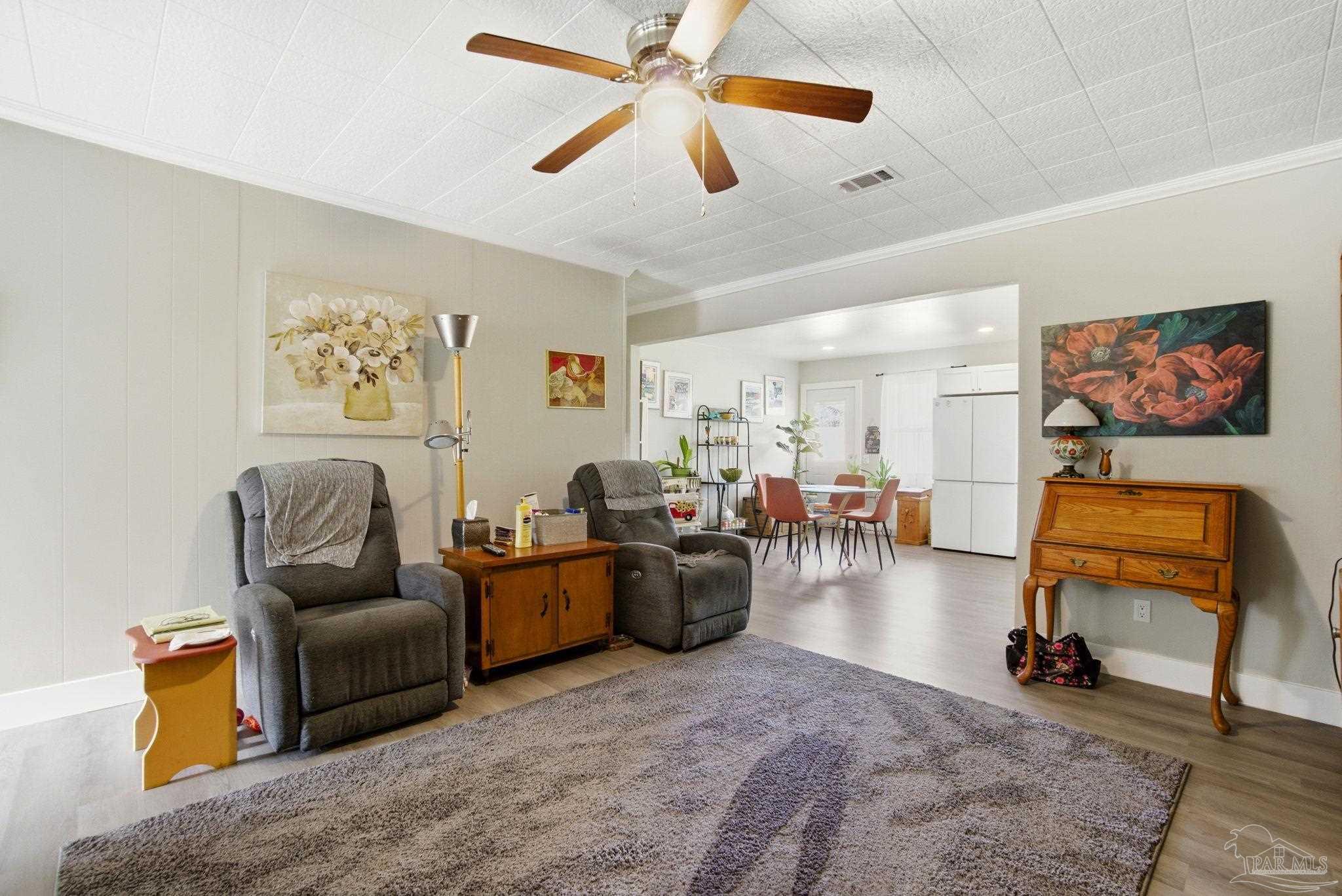 148 San Carlos Road Cantonment, FL 32533 - Photo 9 of 38 a living room with furniture