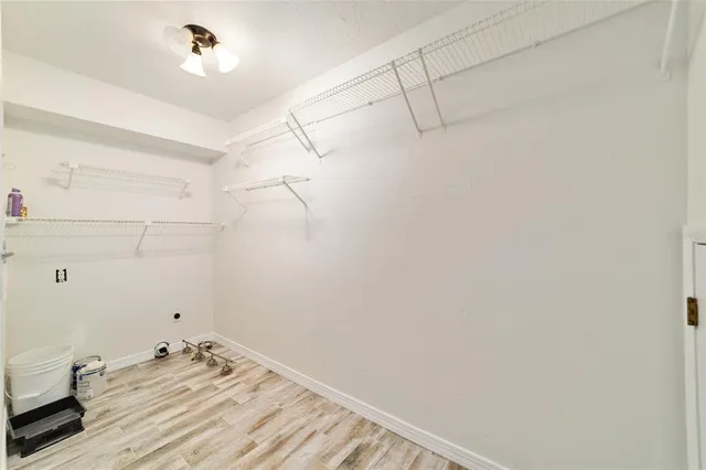 a view of a room with racks on the wall