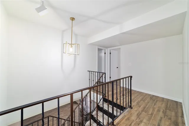 a view of entryway with wooden floor