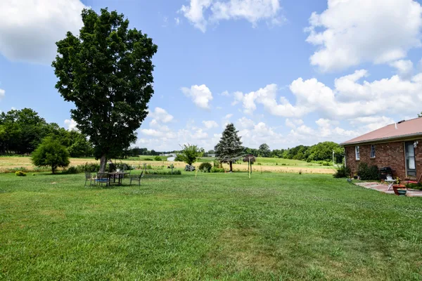 a view of a park with houses