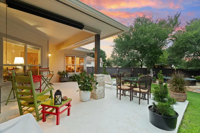 a view of a chairs and tables in the patio