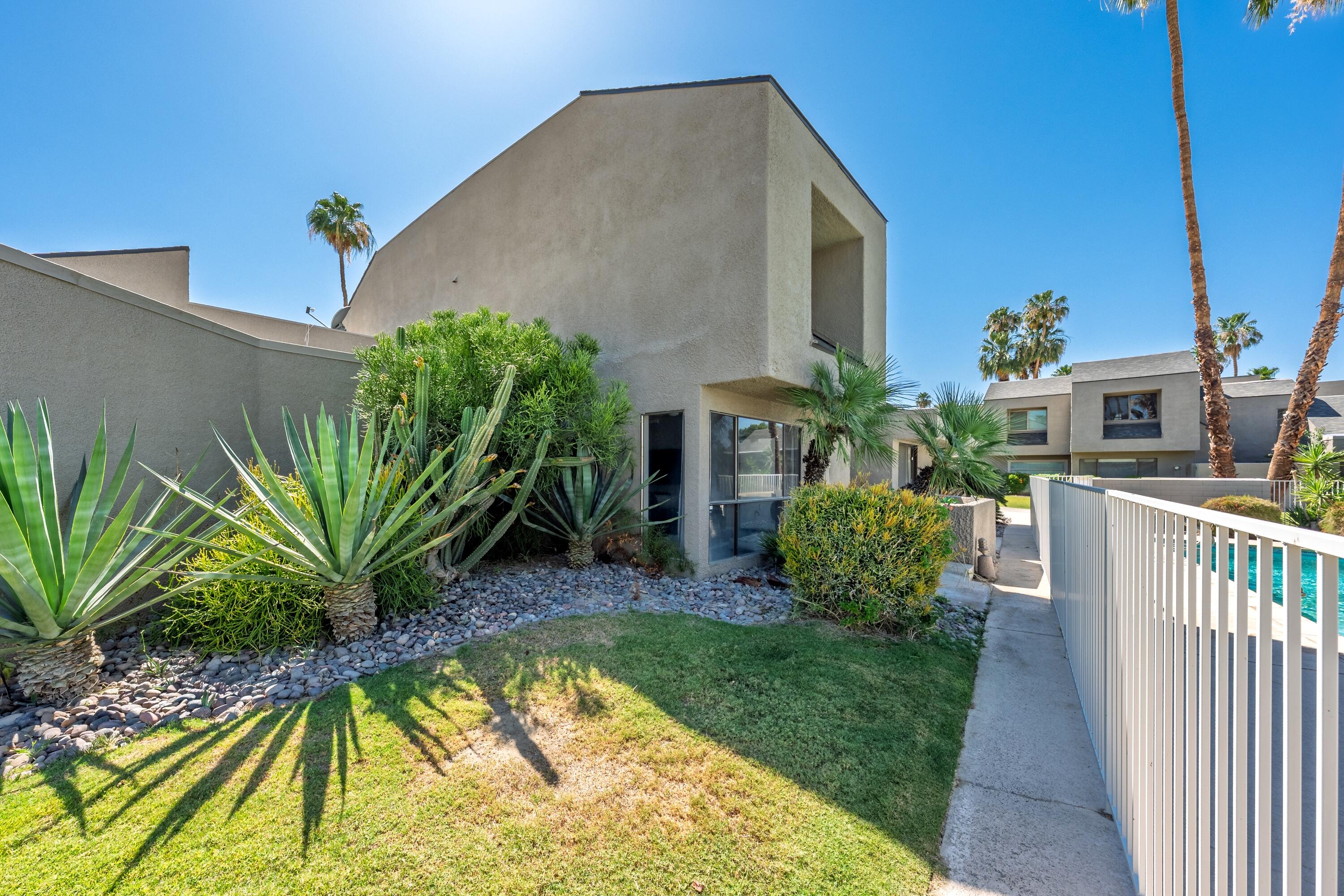 71870 Eleanora Lane Rancho Mirage, CA 92270 - Photo 28 of 36 a view of a house with backyard and sitting area