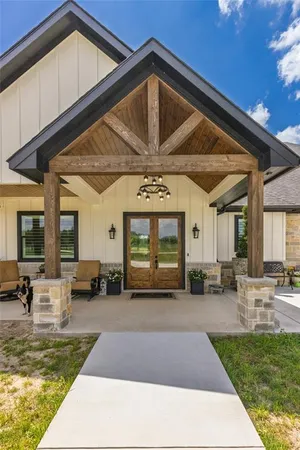 a view of a porch with furniture