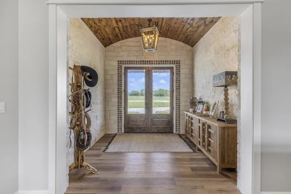 a view of an entryway with a hardwood