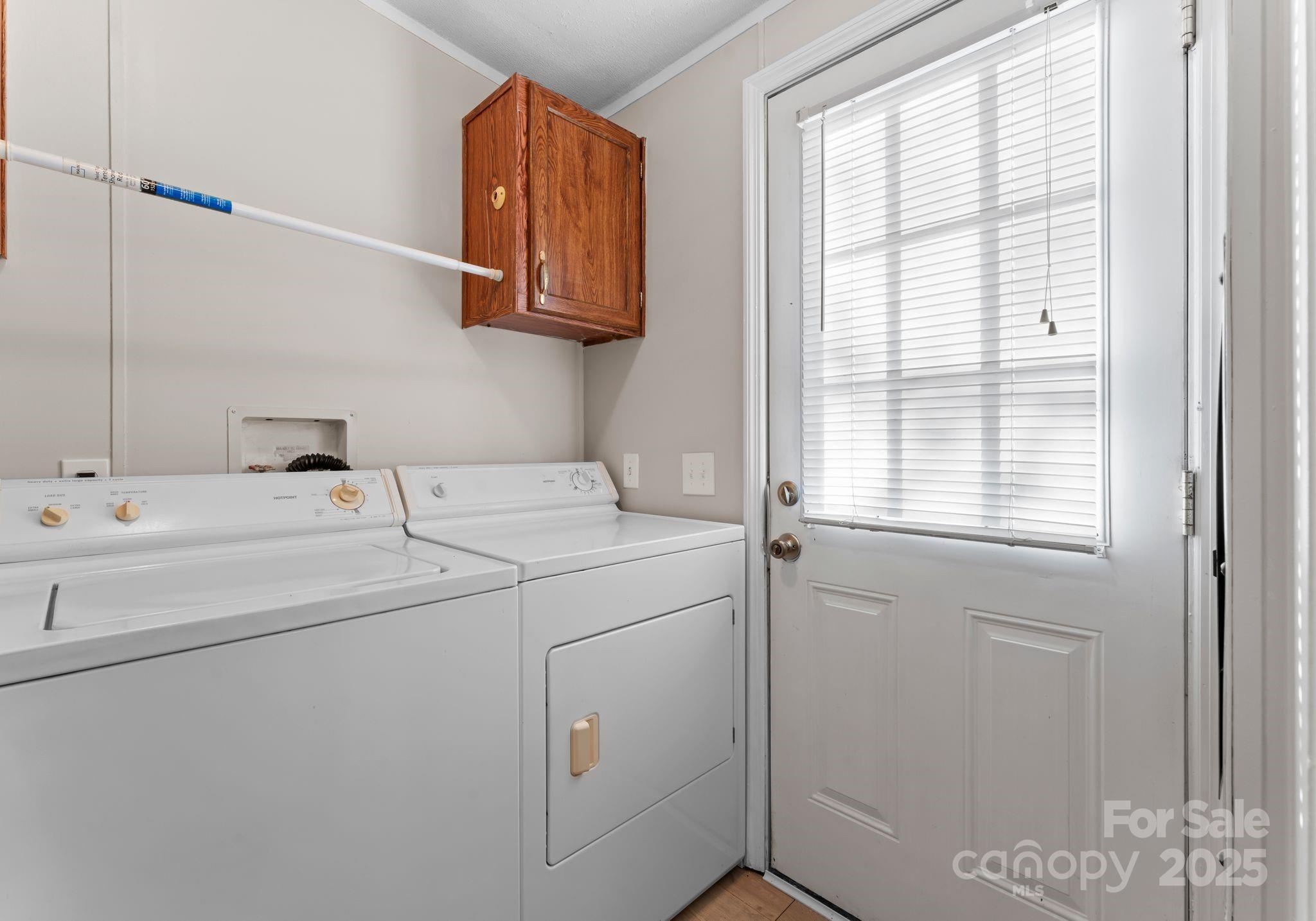 1812 Shearers Road Davidson, NC 28036 - Photo 13 of 40 a utility room with dryer and washer