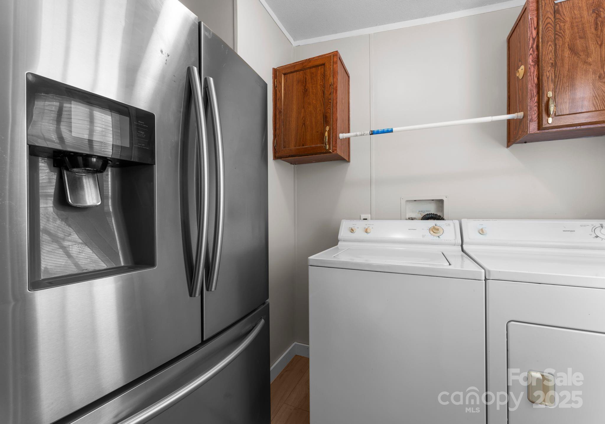 1812 Shearers Road Davidson, NC 28036 - Photo 14 of 40 a utility room with dryer and washer