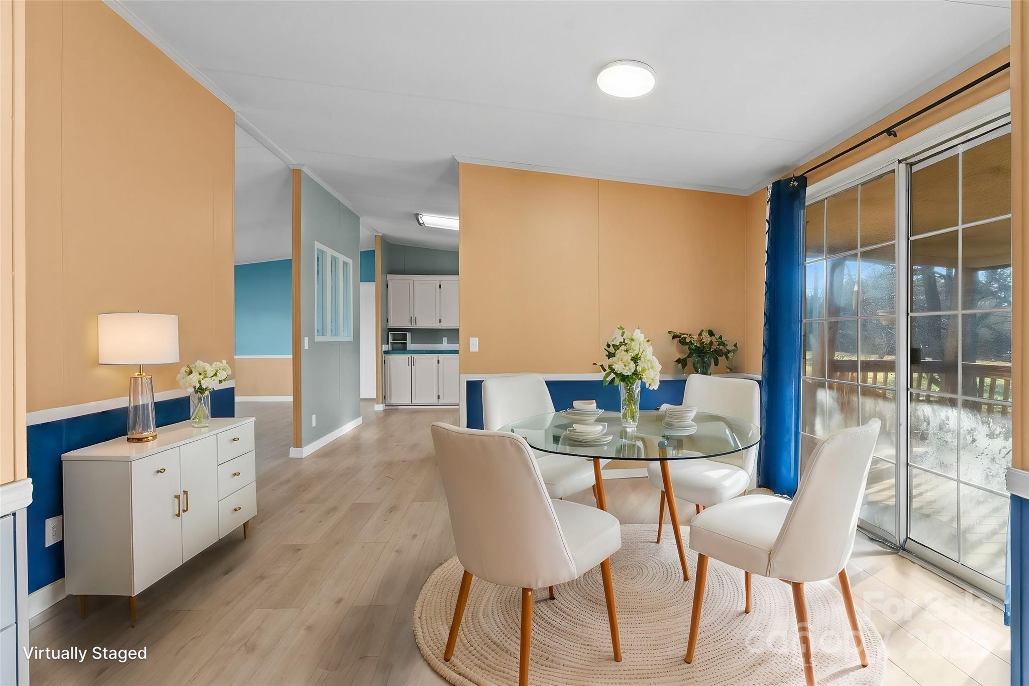1812 Shearers Road Davidson, NC 28036 - Photo 17 of 40 a view of a dining room with furniture and wooden floor