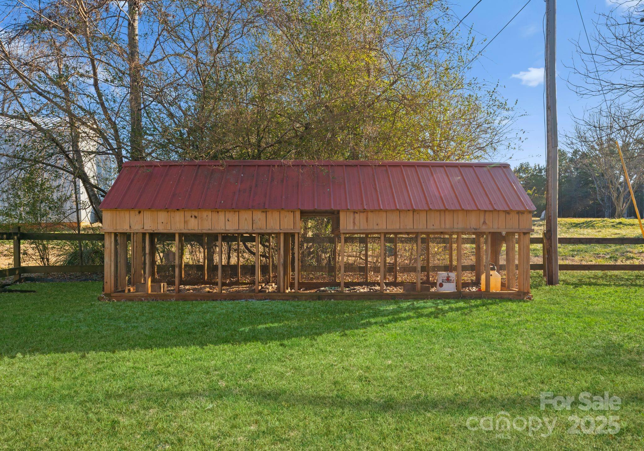 1812 Shearers Road Davidson, NC 28036 - Photo 37 of 40 a view of a house with a yard and sitting area
