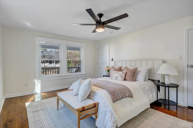 a bedroom with a bed furniture and a window