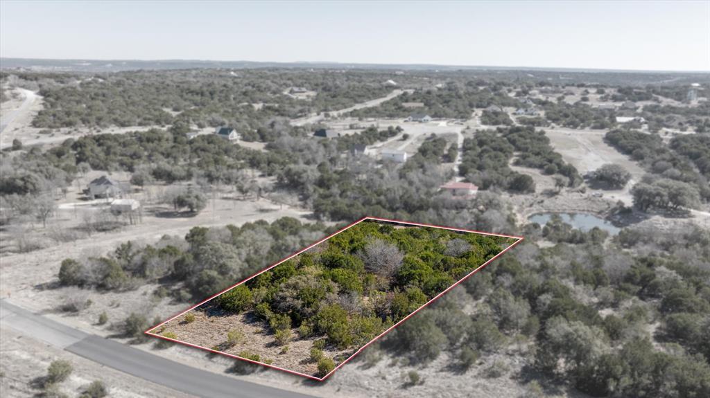 880 Sunfish Point Bluff Dale, TX 76433 - Photo 1 of 17 an aerial view of a residential houses with outdoor space