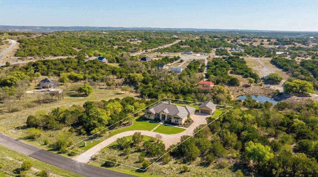 880 Sunfish Point Bluff Dale, TX 76433 - Photo 2 of 17 an aerial view of residential houses with outdoor space