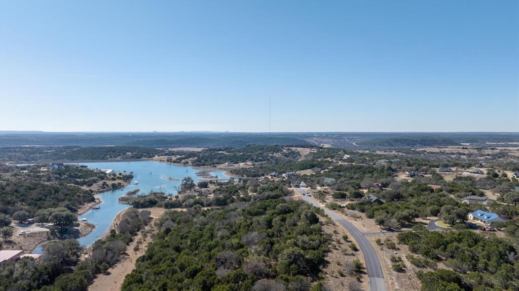 880 Sunfish Point Bluff Dale, TX 76433 - Photo 5 of 17 an aerial view of residential house and green space