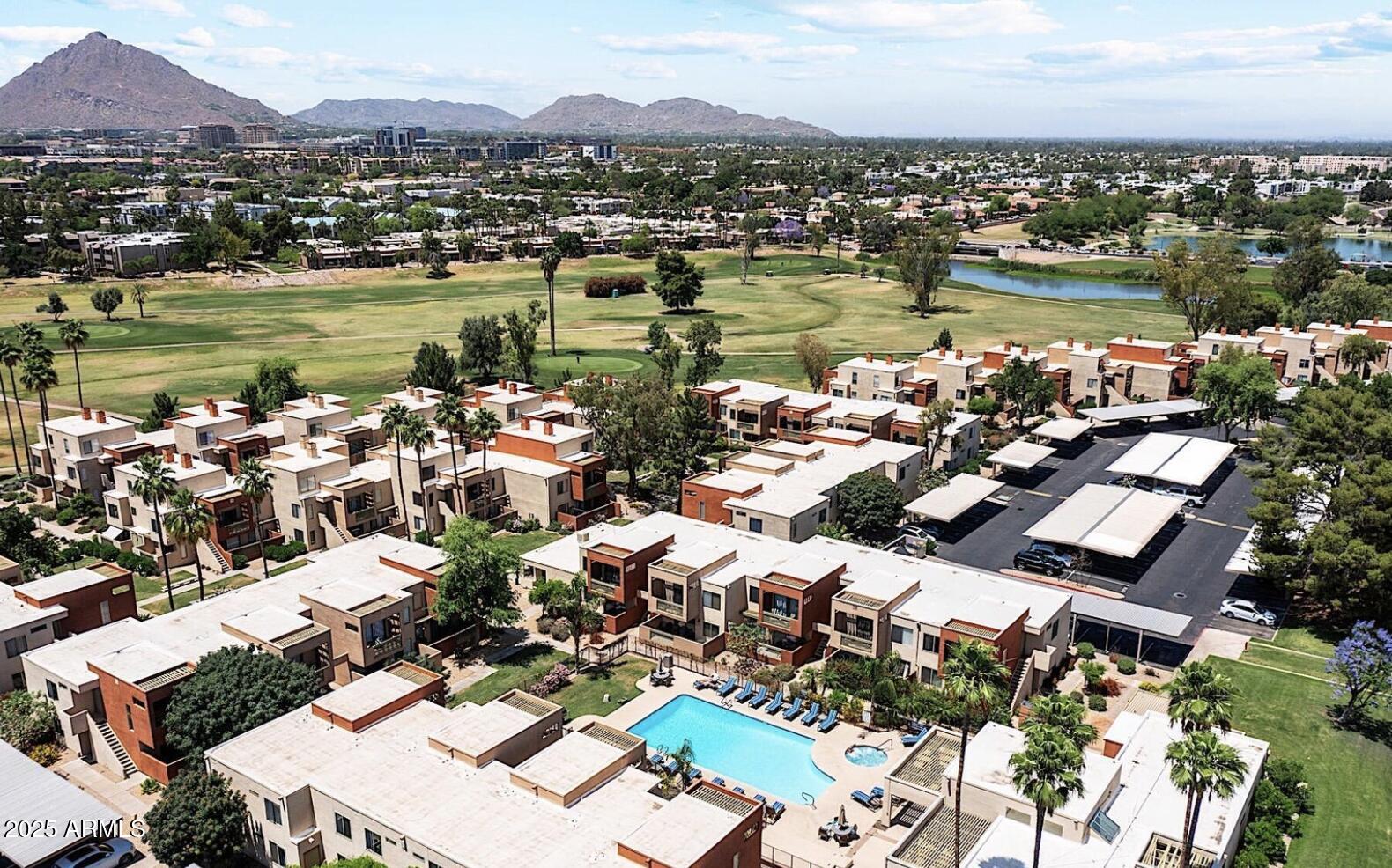 3500 North Hayden Road, Unit 105 Scottsdale, AZ 85251 - Photo 9 of 12 an aerial view of a city with lots of residential buildings lake and ocean view