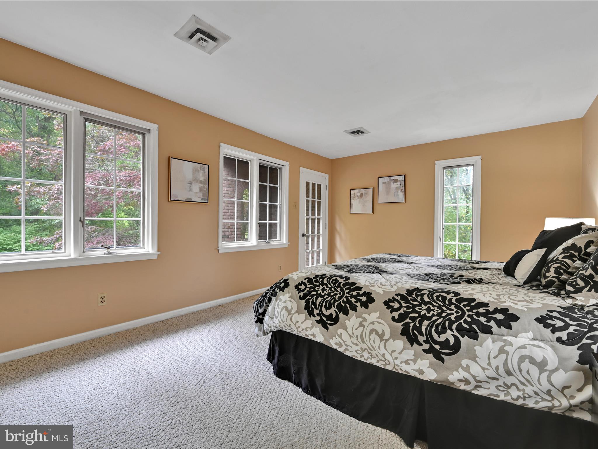 607 Gouglersville Road Reading, PA 19608 - Photo 32 of 44 a bedroom with a bed and a window