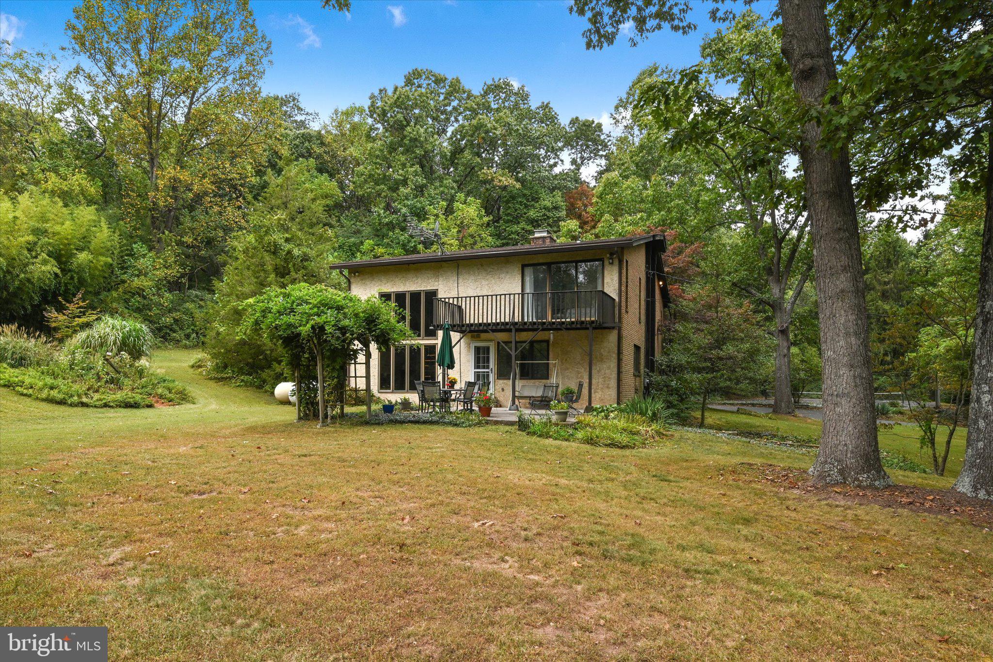 607 Gouglersville Road Reading, PA 19608 - Photo 40 of 44 a front view of a house with a yard