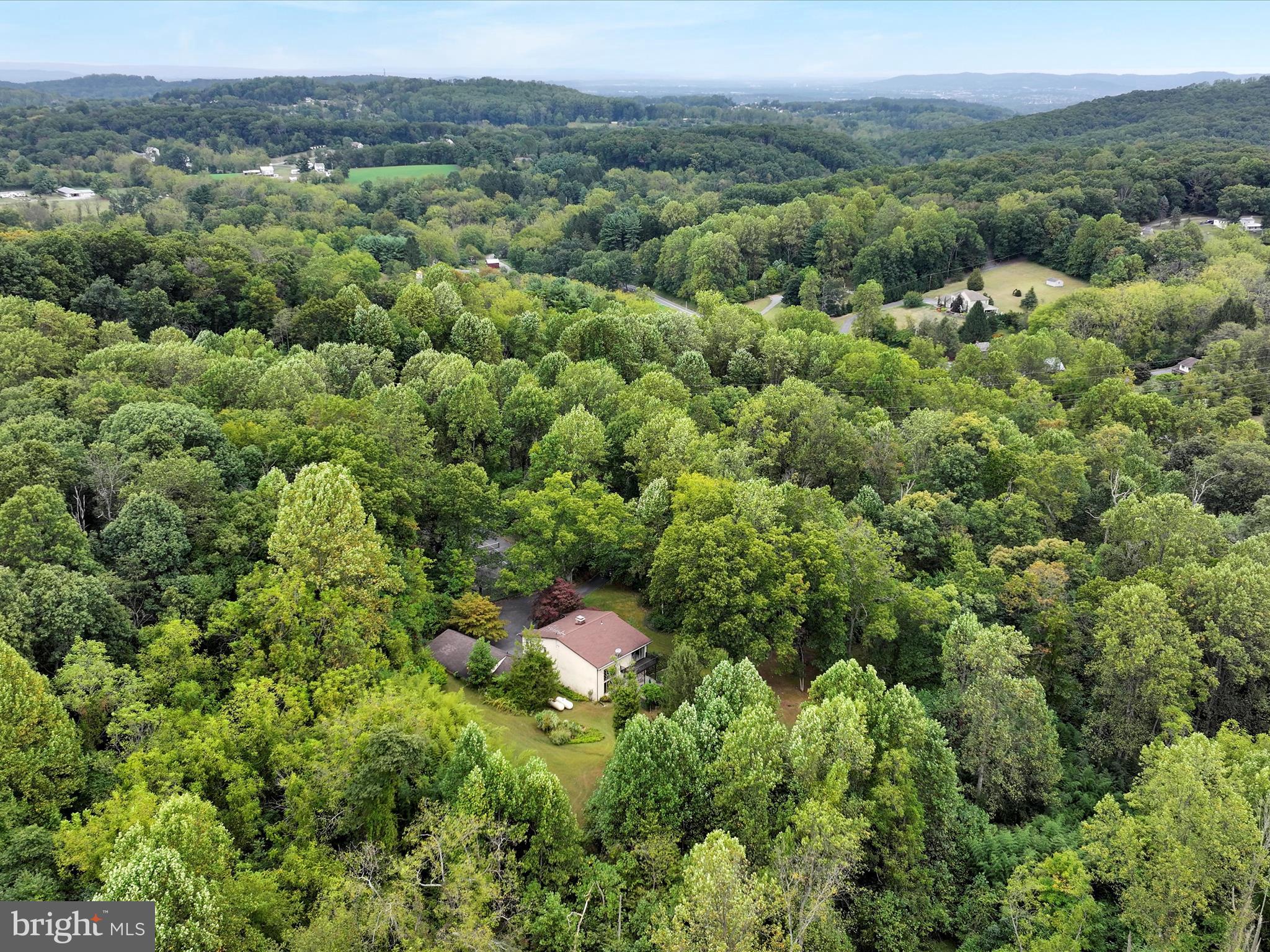 607 Gouglersville Road Reading, PA 19608 - Photo 4 of 44 an aerial view of a house with a yard