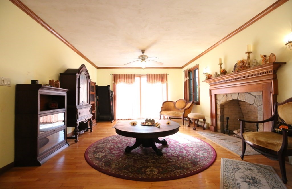 14 Gerrish Road Rochester, MA 02770 - Photo 11 of 40 a view of a livingroom with furniture and a fireplace