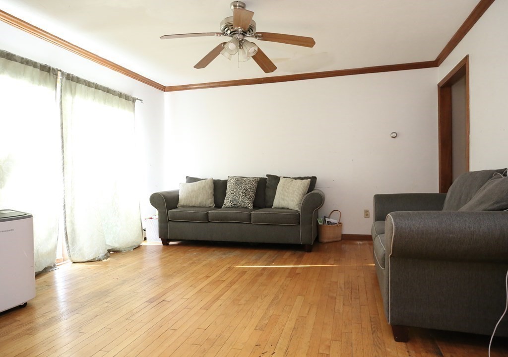 14 Gerrish Road Rochester, MA 02770 - Photo 14 of 40 a living room with furniture and a wooden floor