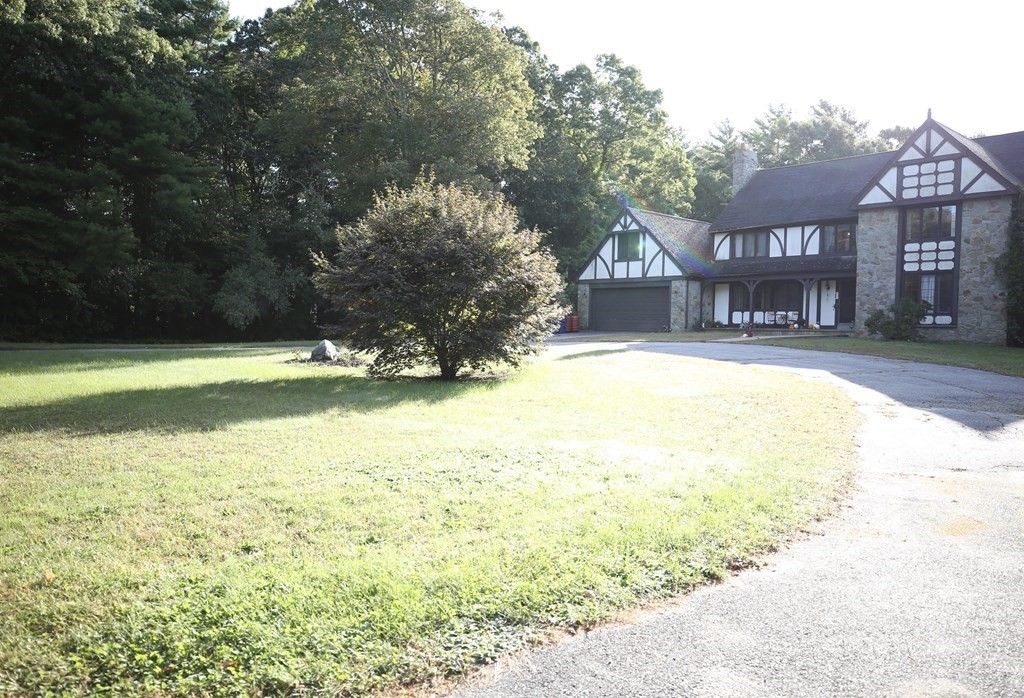 14 Gerrish Road Rochester, MA 02770 - Photo 2 of 40 a view of a house with a yard and a large tree