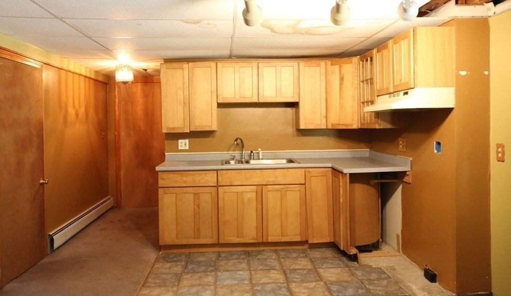 14 Gerrish Road Rochester, MA 02770 - Photo 33 of 40 a bathroom with sink a mirror and a shower