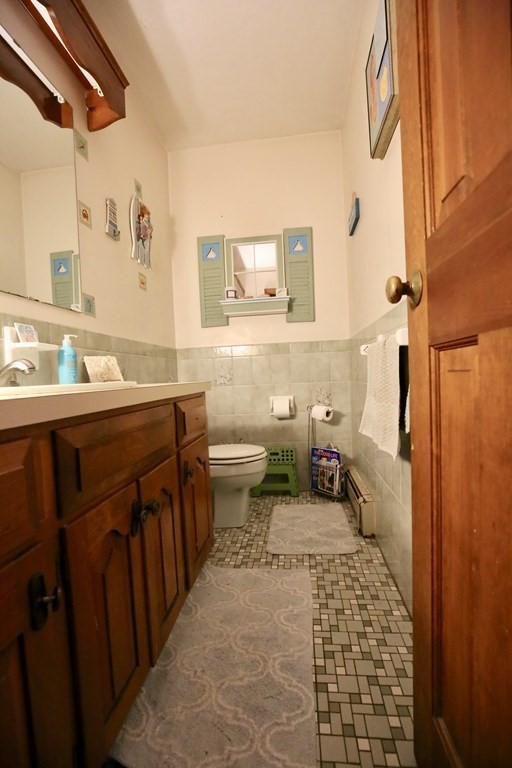 14 Gerrish Road Rochester, MA 02770 - Photo 10 of 40 a bathroom with a sink a toilet and shower