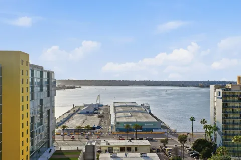 a view of a lake with building and lake