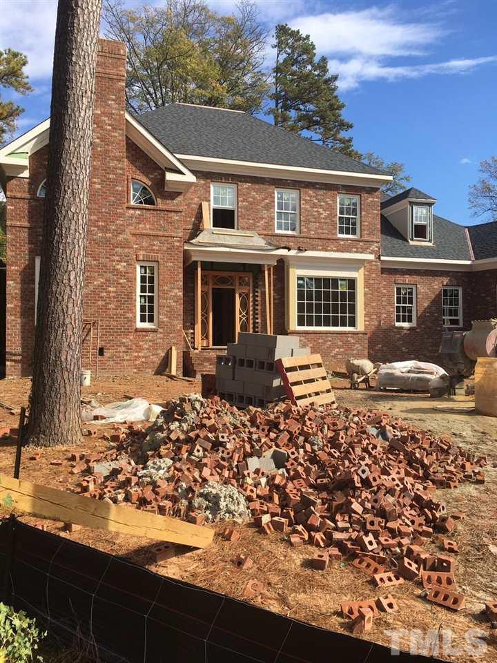 414 Marlowe Road Raleigh, NC 27609 - Photo 1 of 3 front view of a house with a yard