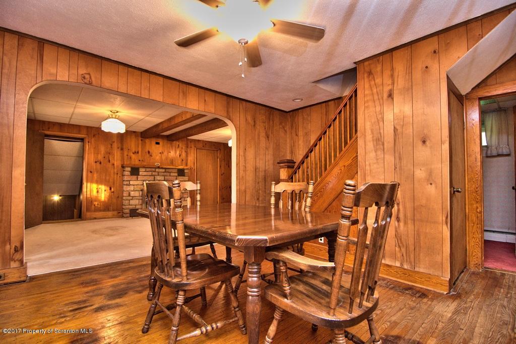 2350 Aberdeen Road Moscow, PA 18444 - Photo 12 of 36 a dining room with furniture and wooden floor