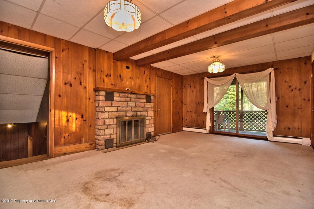 2350 Aberdeen Road Moscow, PA 18444 - Photo 27 of 36 a view of a livingroom with a fireplace