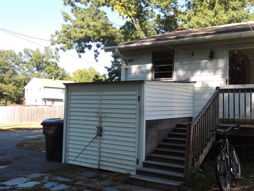 248 Fiberloid Street Springfield, MA 01151 - Photo 9 of 23 a view of a house with a yard