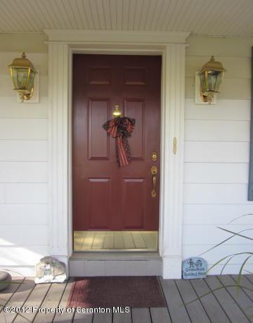 1121 Motichka Road Moscow, PA 18444 - Photo 5 of 59 a view of a hallway with wooden door