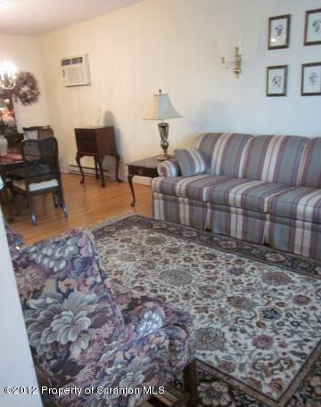 1121 Motichka Road Moscow, PA 18444 - Photo 7 of 59 a living room with furniture