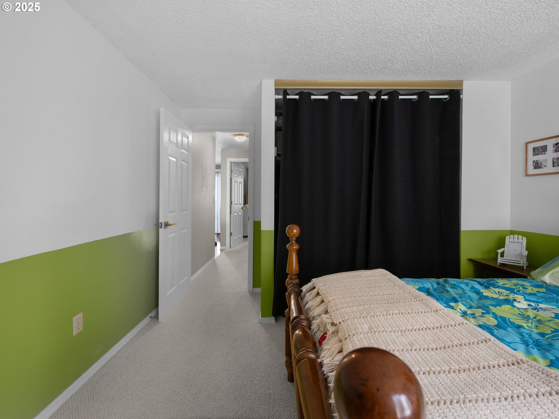 159 Southwest Florence Avenue, Unit 62 Gresham, OR 97080 - Photo 14 of 30 a bedroom with a bed and a dresser