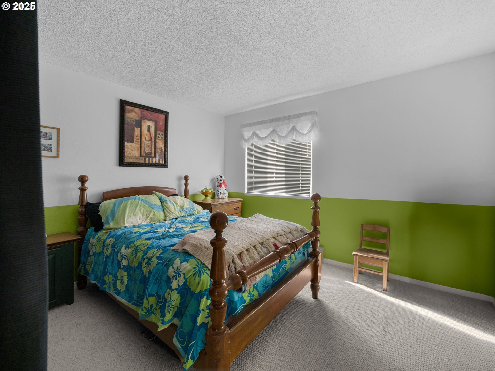 159 Southwest Florence Avenue, Unit 62 Gresham, OR 97080 - Photo 15 of 30 a bedroom with a bed and a window