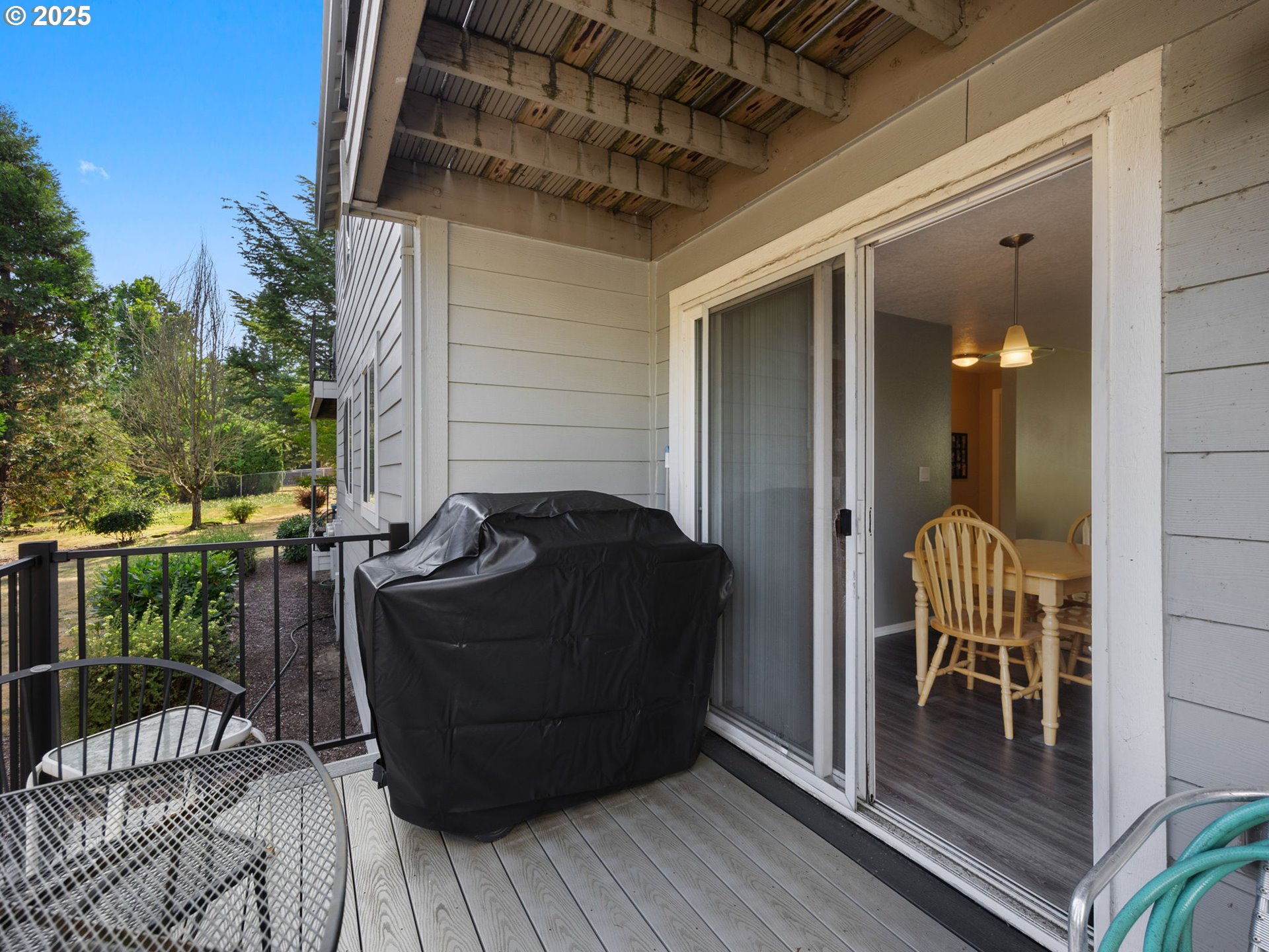 159 Southwest Florence Avenue, Unit 62 Gresham, OR 97080 - Photo 19 of 30 a view of balcony with two chairs and a table