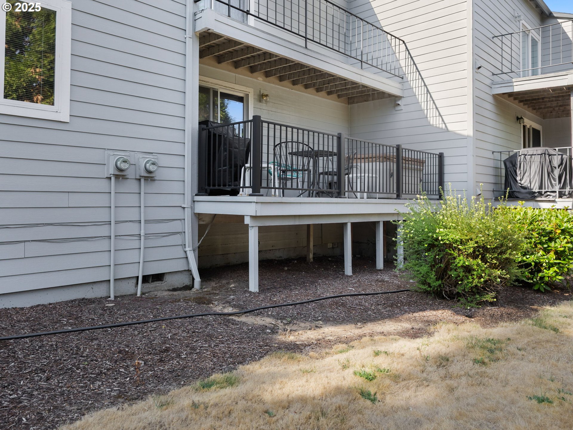 159 Southwest Florence Avenue, Unit 62 Gresham, OR 97080 - Photo 20 of 30 a view of a house with a yard and sitting area