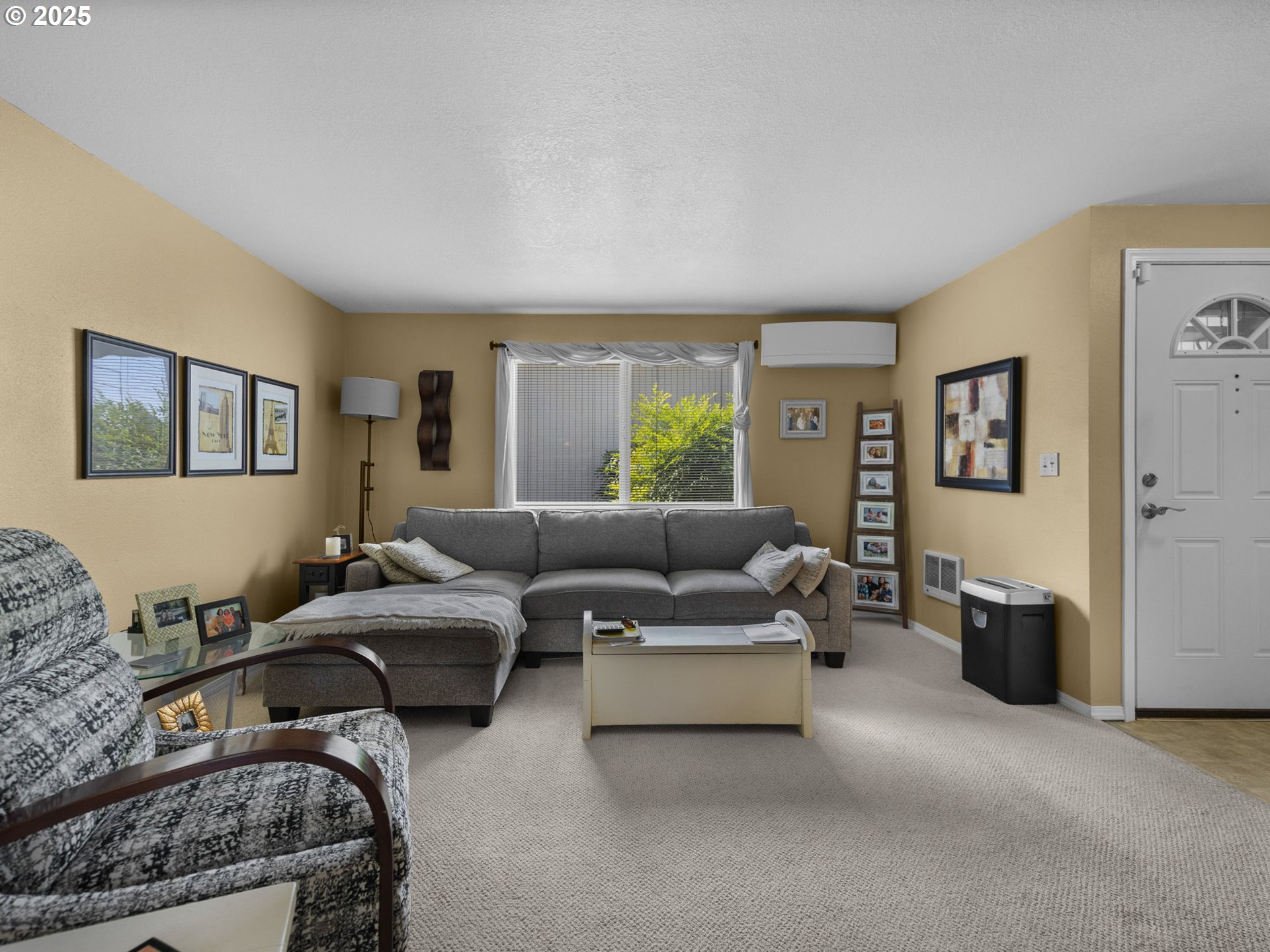 159 Southwest Florence Avenue, Unit 62 Gresham, OR 97080 - Photo 2 of 30 a living room with furniture and a window